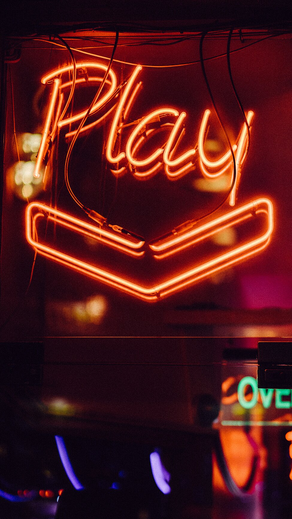 Neonlights saying "play"